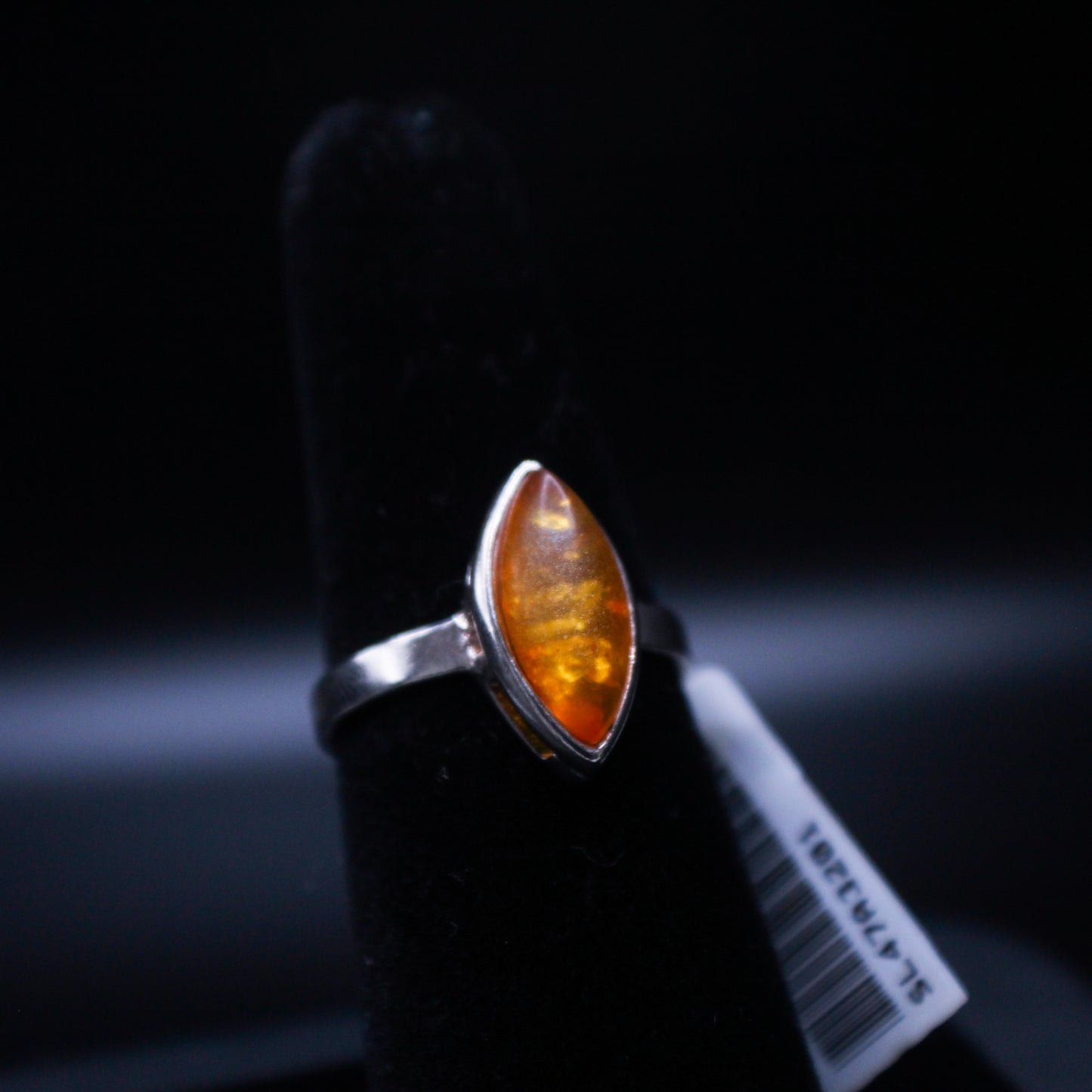 Johnny's Ice & Co SC-3201 Marquise Amber V1 ring with a marquise-shaped amber gemstone on a silver band.