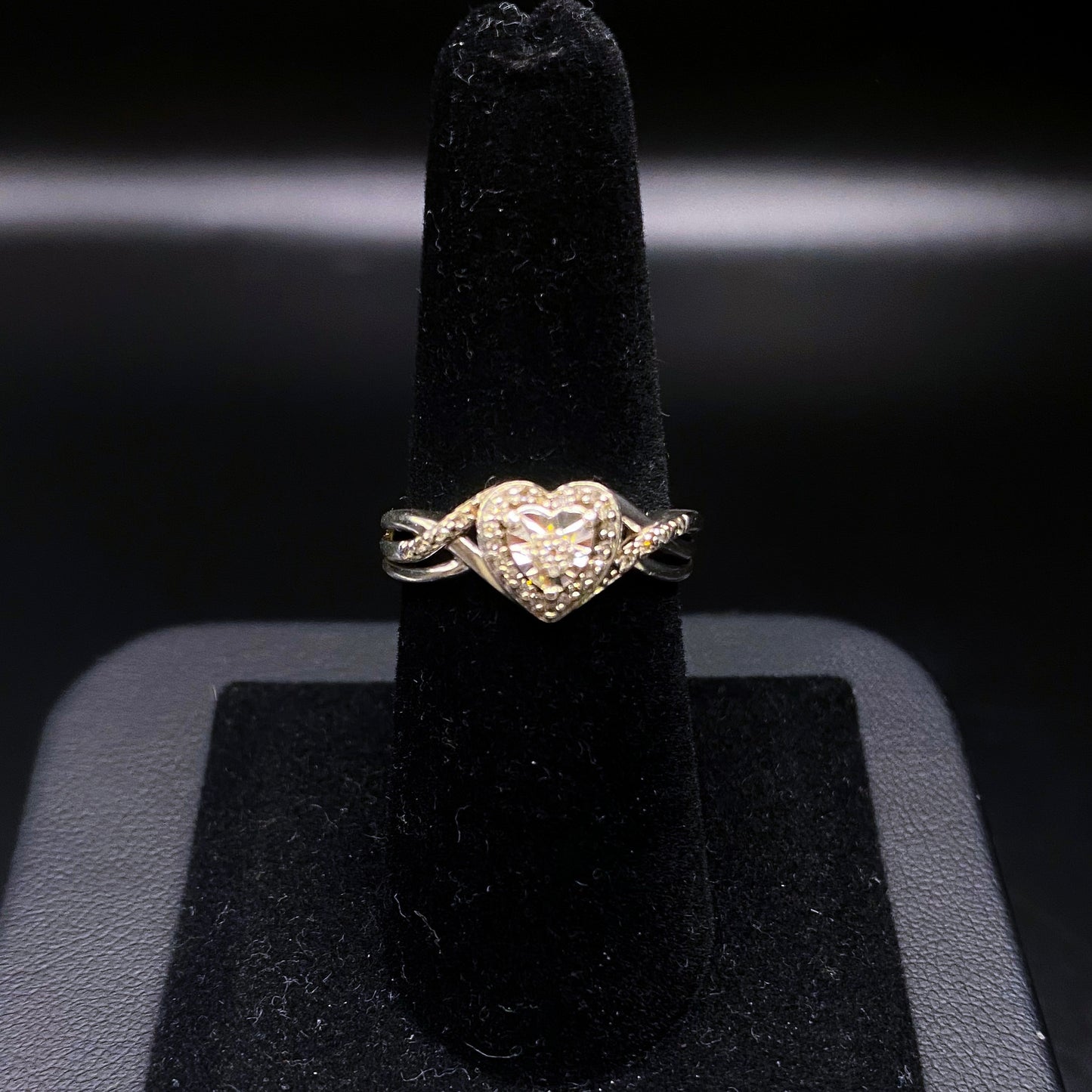 Silver heart-layer ring by Johnny's Ice & Co featuring a layered design with heart-shaped accents.