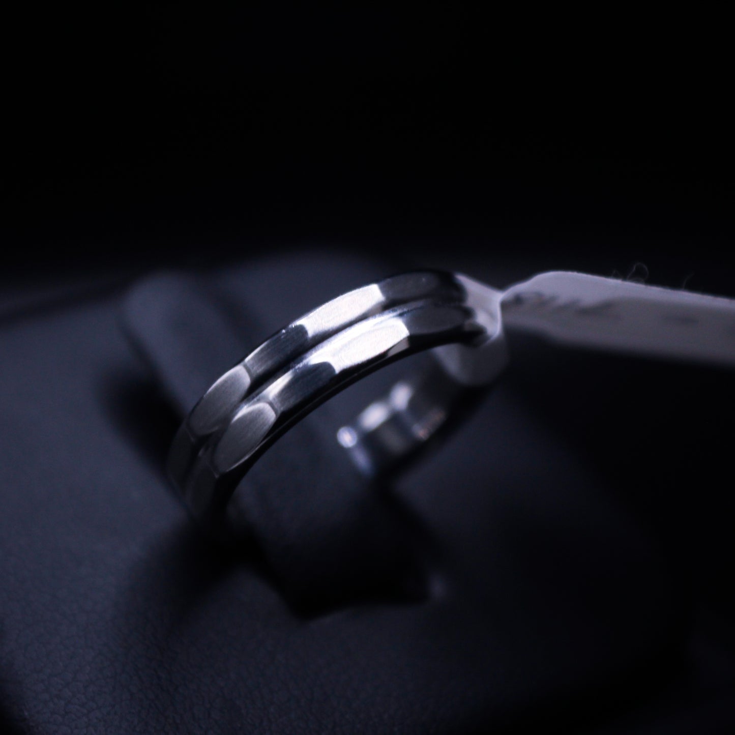 Johnny's Ice & Co steel band ring, durable stainless steel jewelry with a sleek, polished finish on a plain band design.