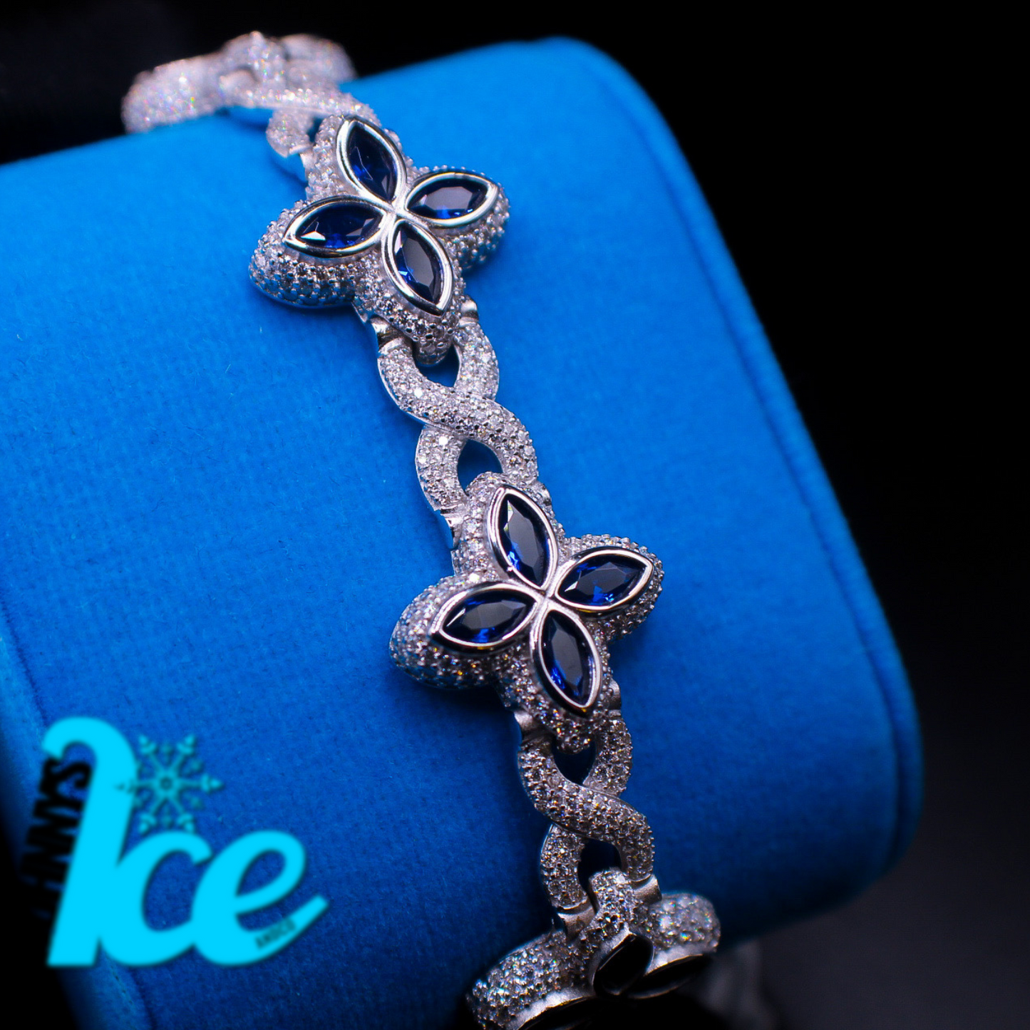 clover bracelet wrapped around a blue display