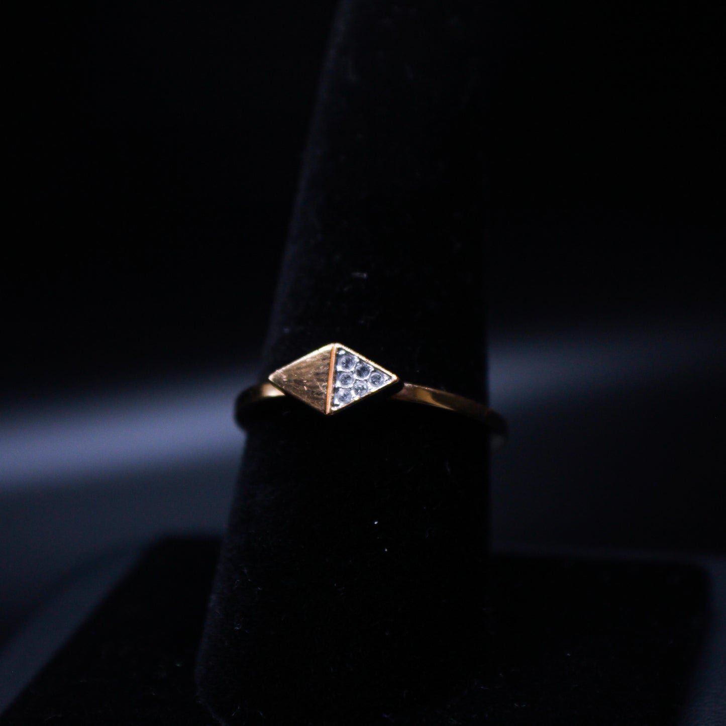 Johnny's Ice & Co JI-4455 two triangle one stone ring with geometric design and silver finish, close-up view of the jewelry.