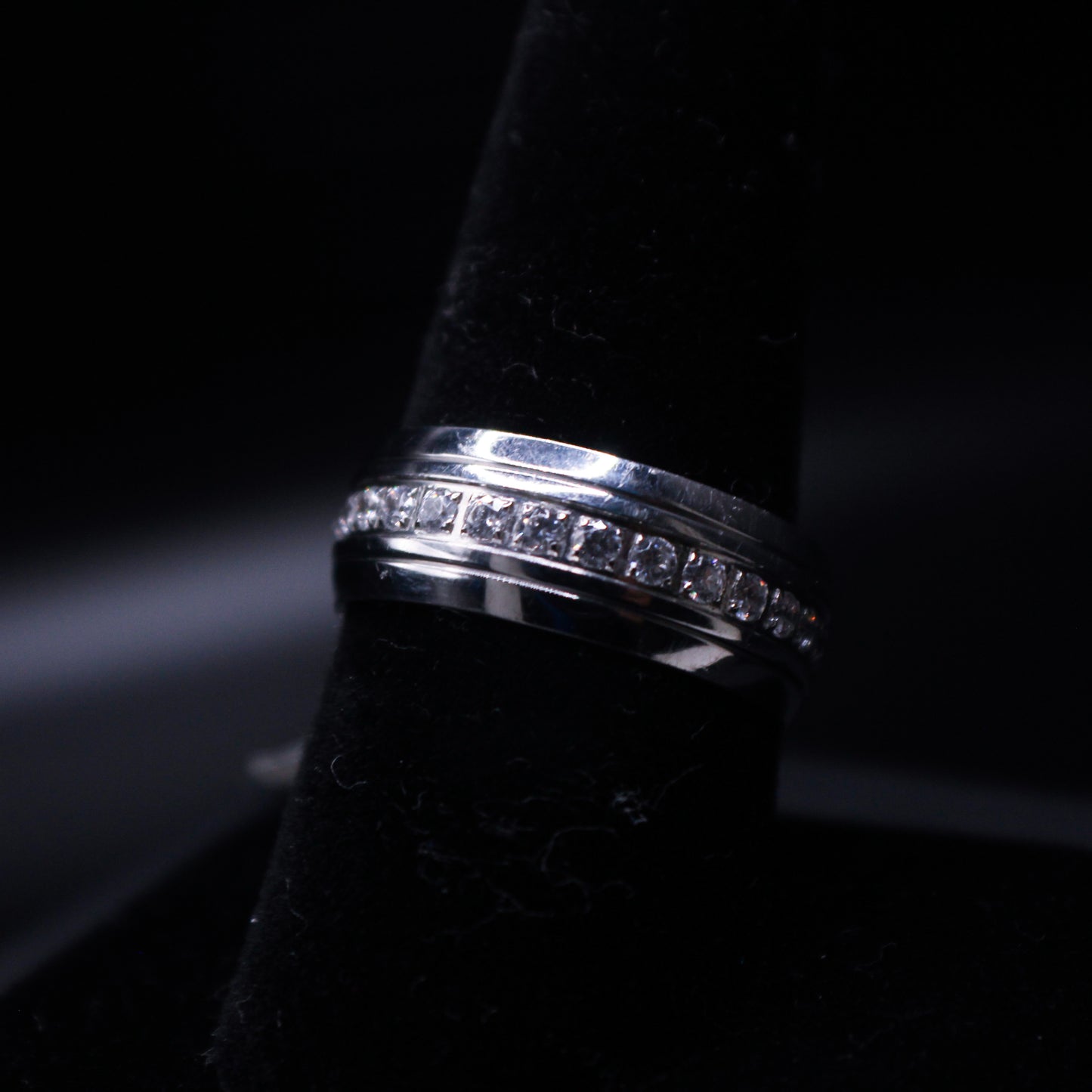 Silver ring from Johnny's Ice & Co, The Silver Lining collection, featuring a sleek, polished design with subtle engraved details.