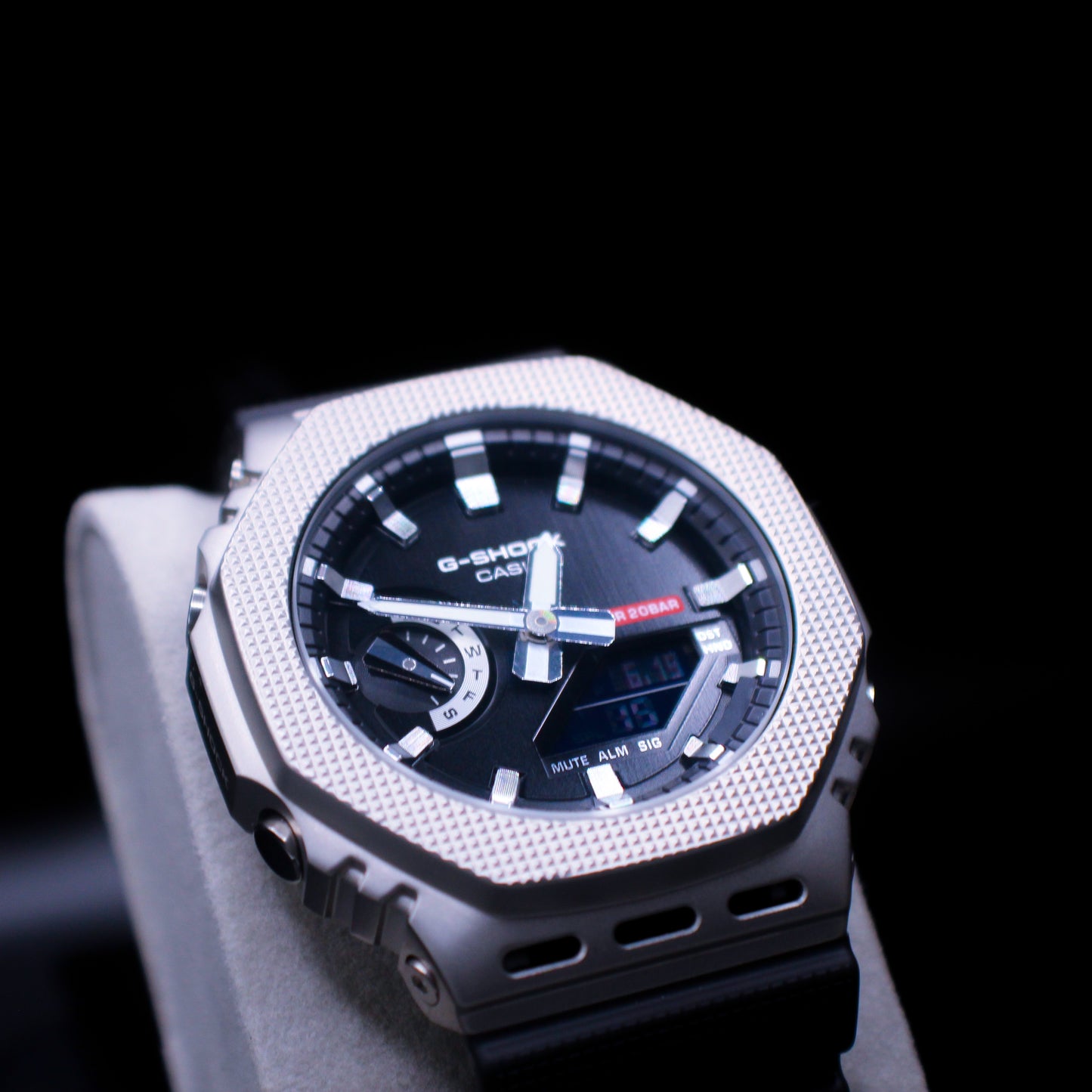 Johnny's Ice & Co CARBON G GM2100G watch with black band and digital display, featuring a sleek, modern design.