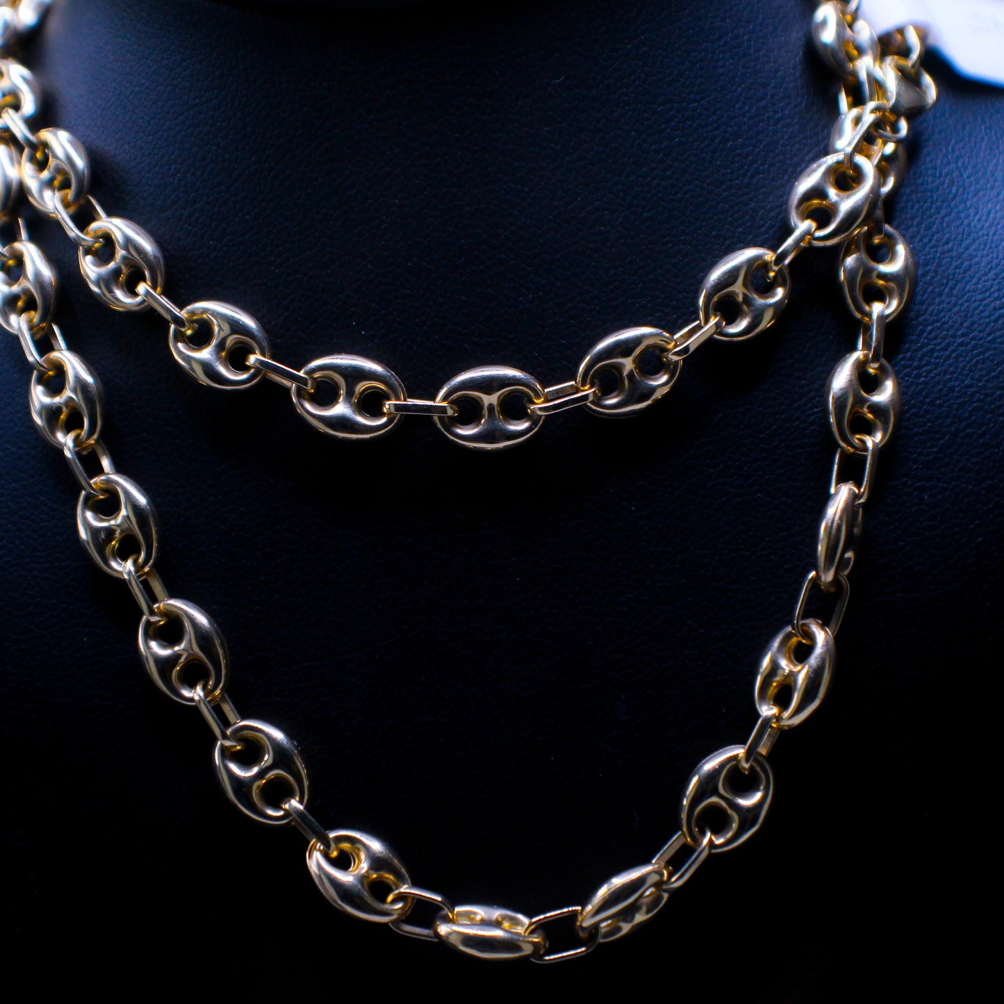 Golden Gucci Bean Chain by Johnny's Ice & Co featuring interlinked bean-shaped links on a neutral background.