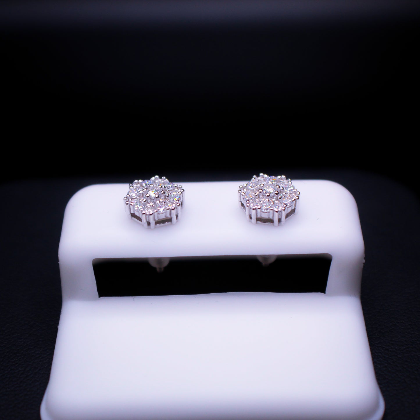 Silver snowflake earrings by Johnny's Ice & Co featuring intricate snowflake designs perfect for winter accessories.
