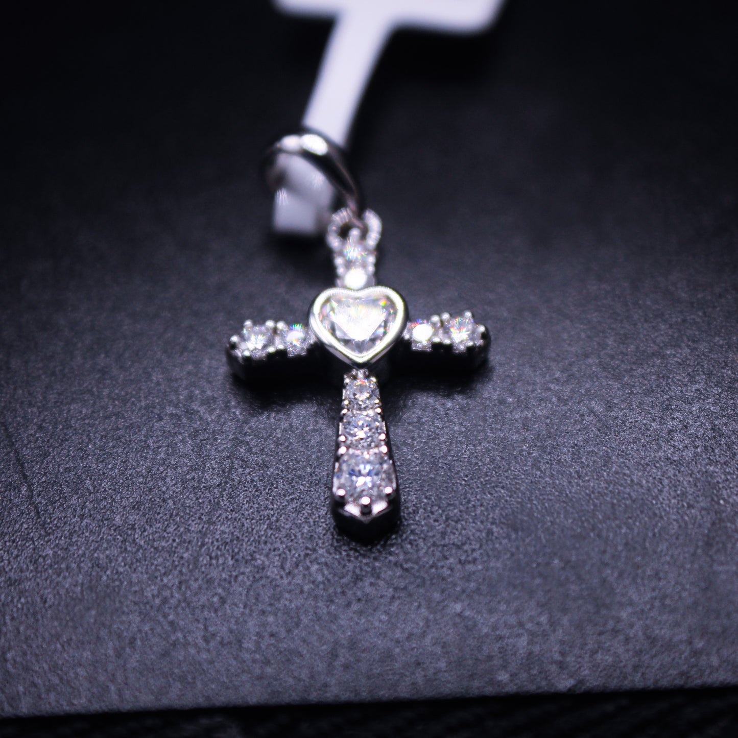 Johnny's Ice & Co Heart cross pendant showing a silver pendant with a heart and cross design on a chain.
