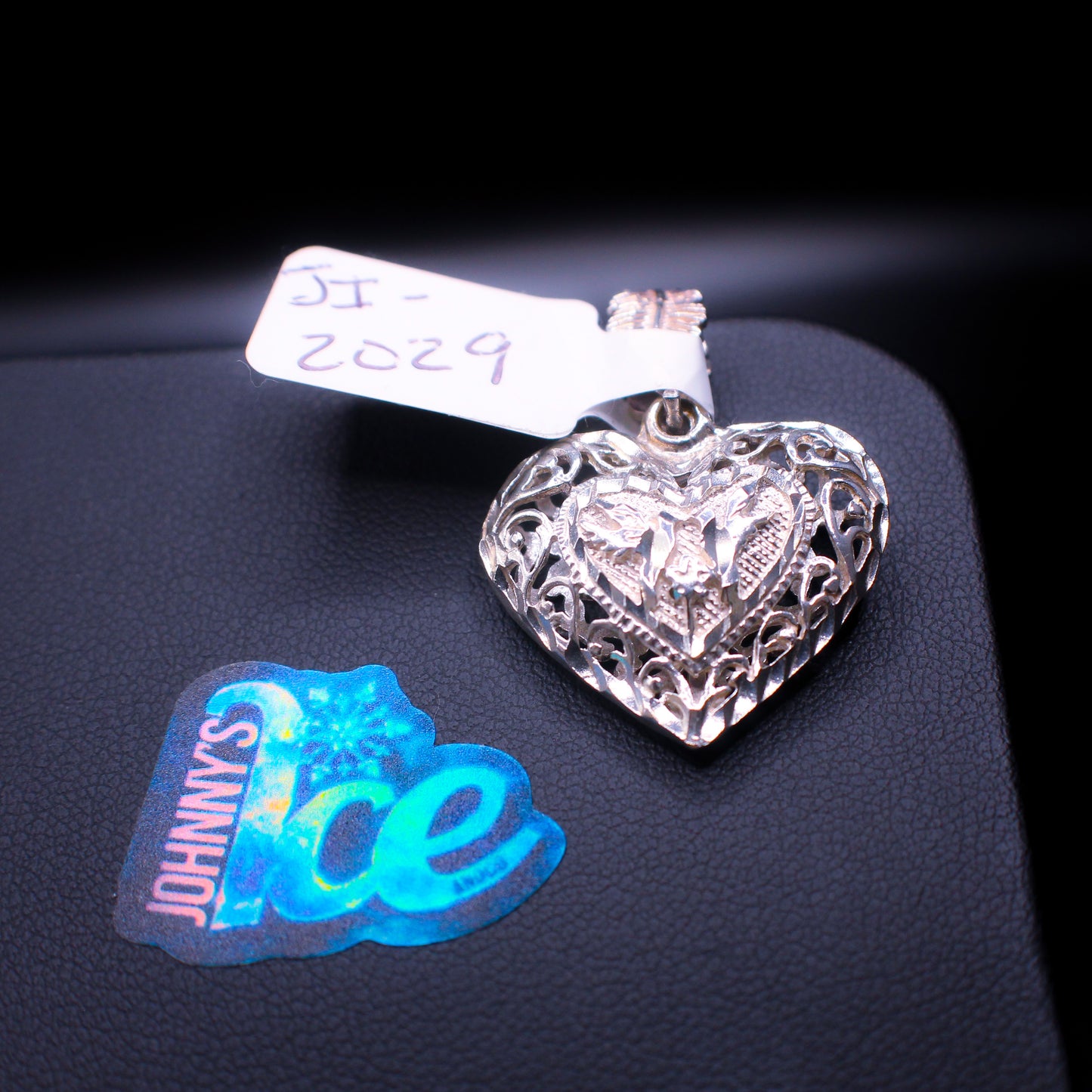 Sterling silver angelic dove pendant by Cash in, featuring a detailed dove design with a small loop for chain attachment.