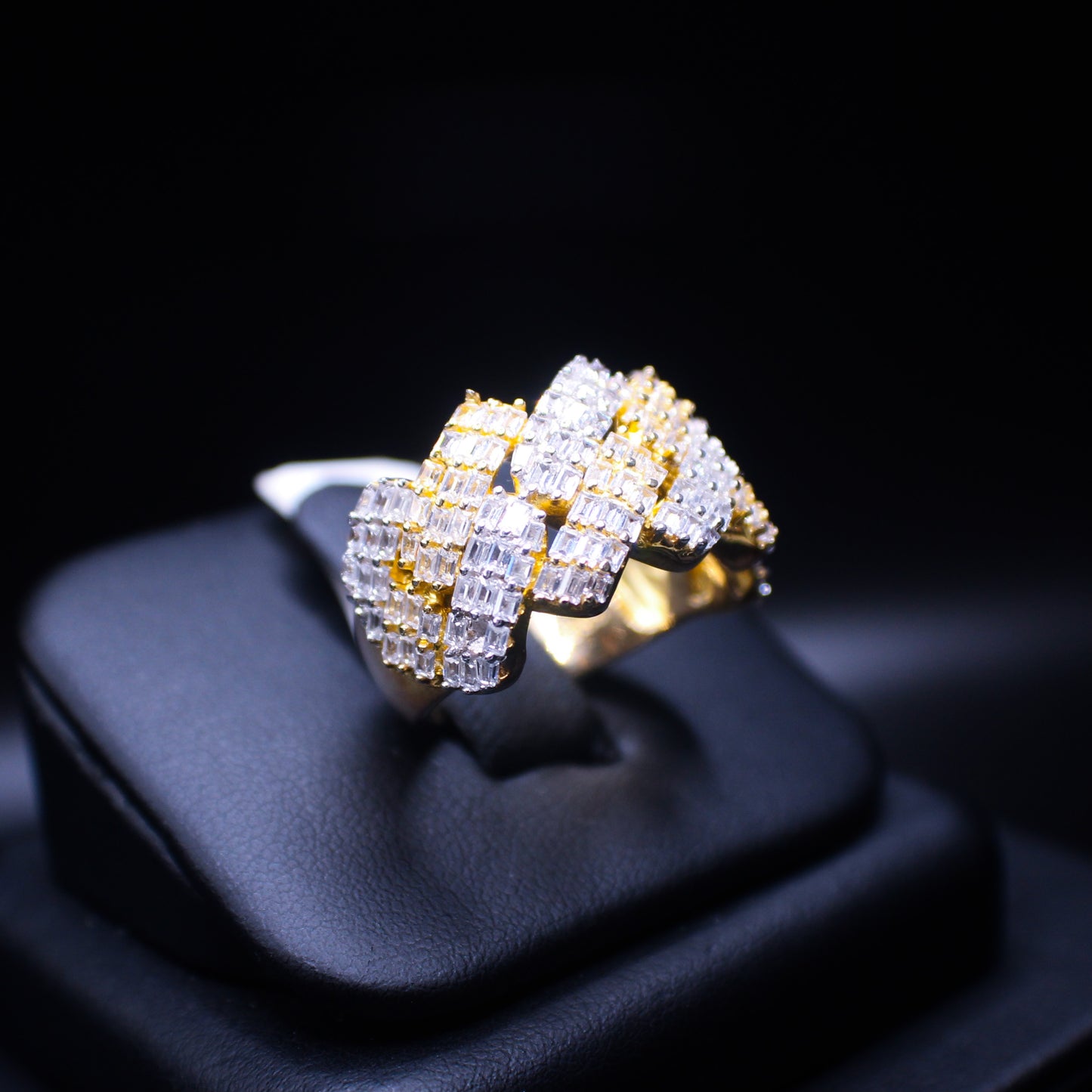 Two-tone finish baguette ring by Johnny's Ice & Co featuring a sleek, modern design with rectangular baguette gemstones.