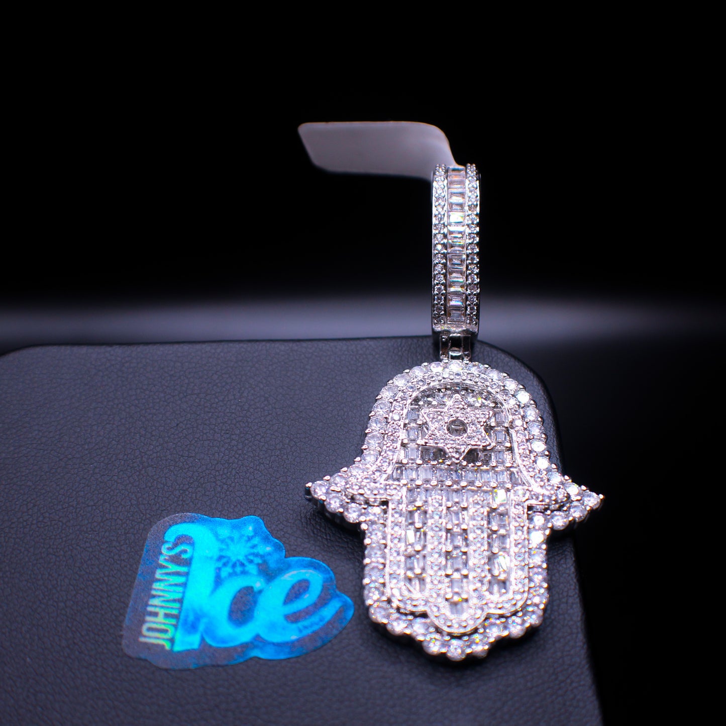 Baguette Hamsa from Johnny's Ice & Co with intricate Hamsa design on a fresh baguette-shaped cake
