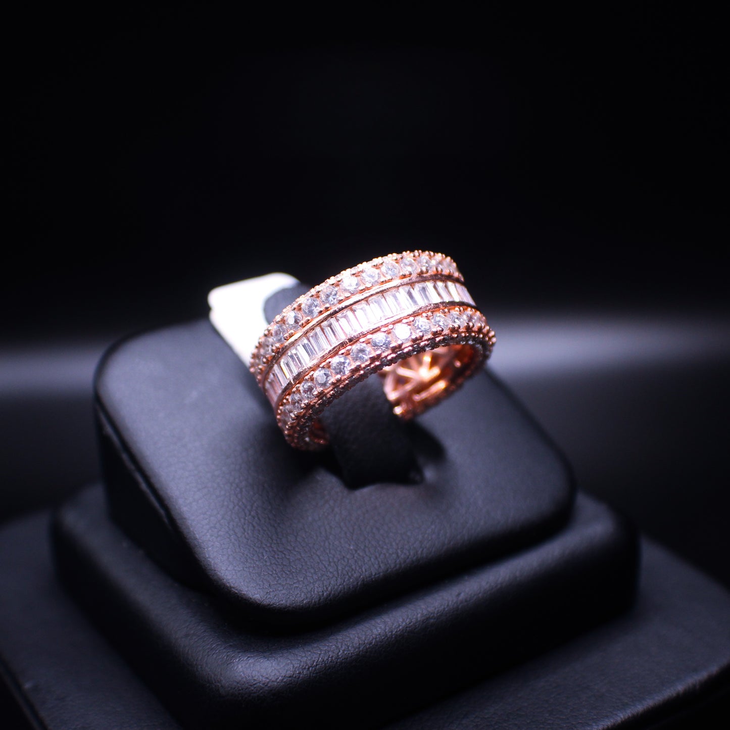 925 sterling silver on rose gold eternity band ring with baguette cut stones, designed by JohnnysIceAndCo